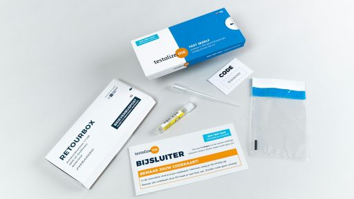 a white table topped with medical supplies and a package